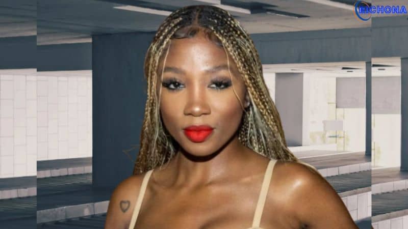 "Professional female podcaster speaking into a microphone in a modern studio, surrounded by podcasting equipment, highlighting Loren Lorosa’s media influence and career."